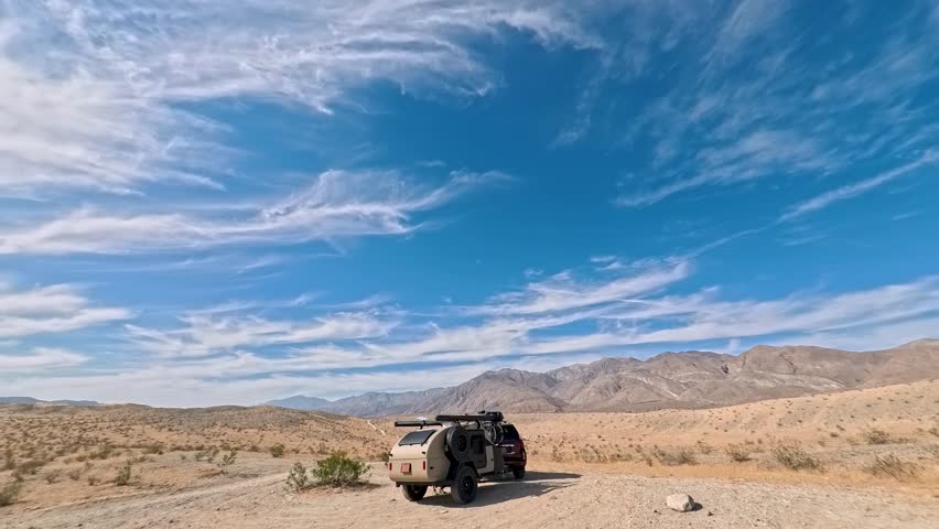 Watch the setup of a teardrop camper trailer in Anza Borego State Park, California, showcasing the surrounding desert landscape.
