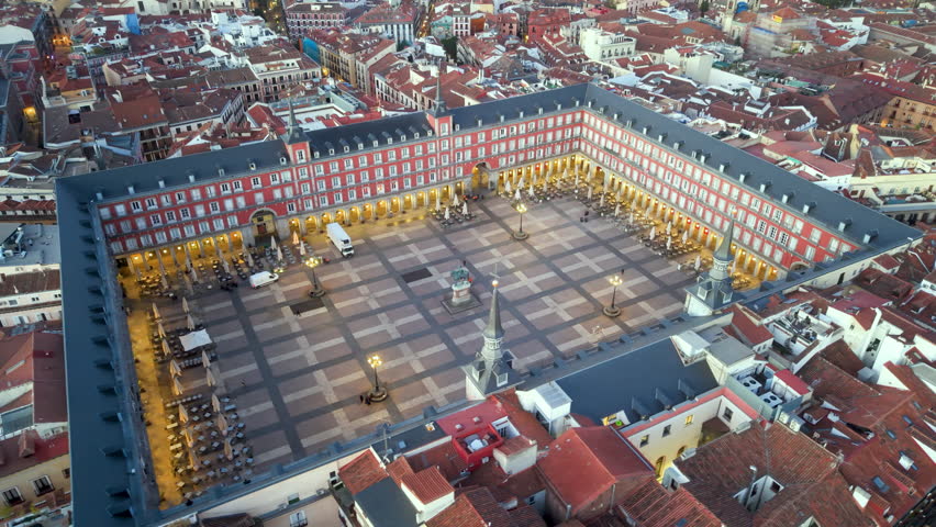 Aerial view of Plaza Mayor At Madrid. Spain. Medieval Buildings Landscape. Downtown District. Madrid At Community Of Madrid Spain. 