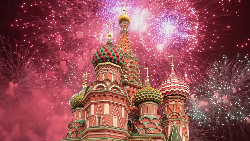 Temple of Basil the Blessed and fireworks in honor of Victory Day celebration (WWII), Red Square, Moscow, Russia. Time lapse 