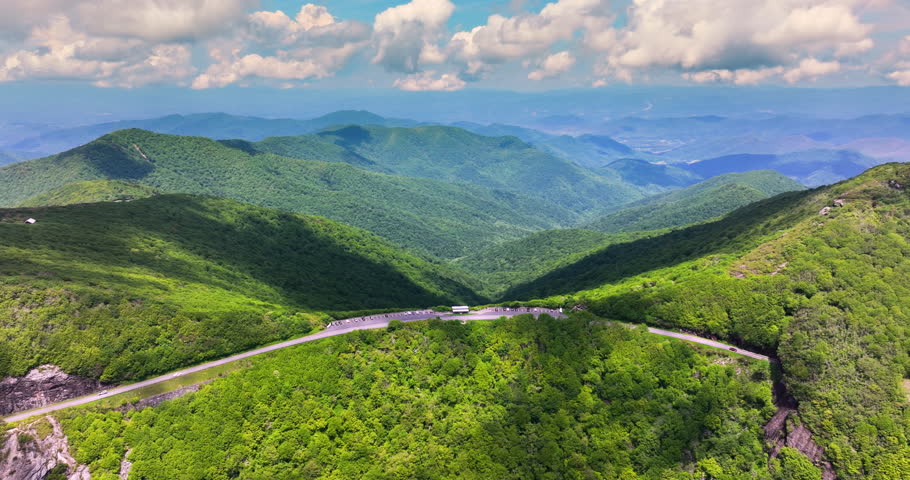 Craggy Gardens overlook in Appalachian Mountains in summer. Car parking area for hikers and travelers. Mountain pass in North Carolina.
