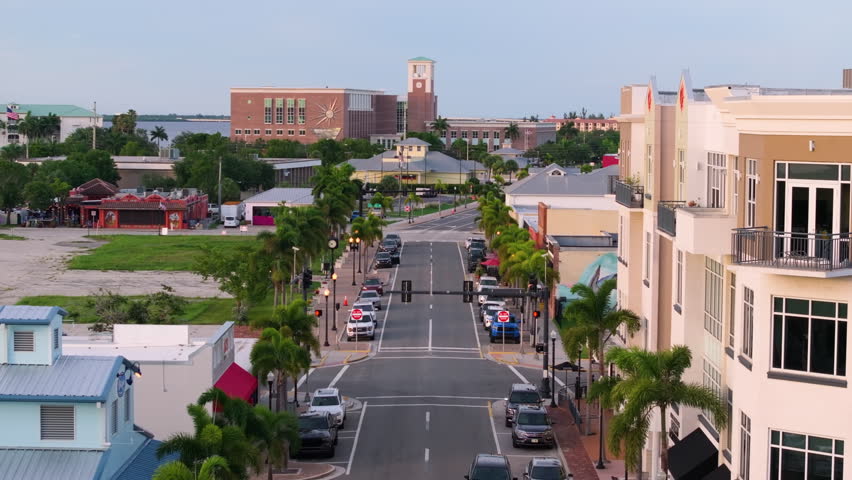 Historic town center of Punta Gorda, Florida with traditional buildings, shops and restaurants along a quiet street representing authentic small town America.