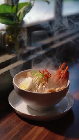Curry Laksa which is a popular traditional spicy noodle soup from the culture in Asia. noodle soup with shrimp, tofu and sprouts, selective focus