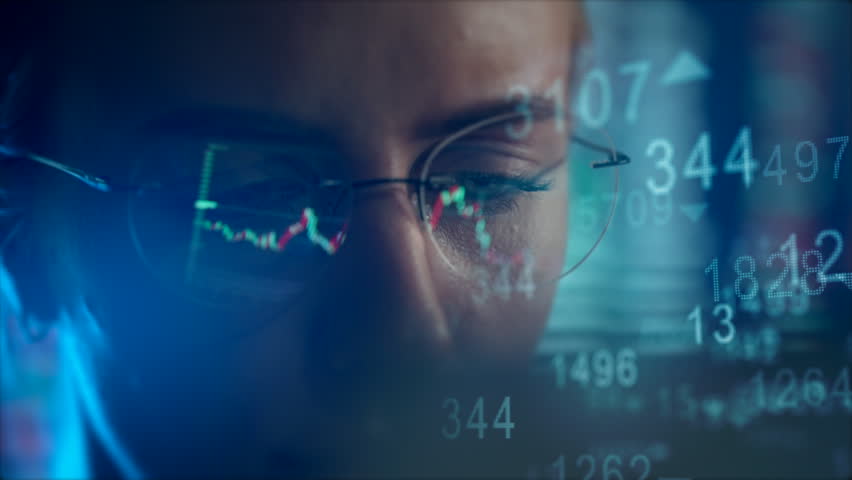 Trader Eyeing Volatile Stock Market Charts Reflected in Glasses. Financial Analysis, Investment Strategy, Bull Bear Trends, Economic Data Monitoring, Professional Broker. Forex Crypto Futures Trading