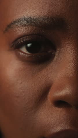Face, eyes or woman with optometry at clinic, vision assessment or contact lenses for visual correction. Eye care, portrait and black person with check for optical wellness, glaucoma test and blink