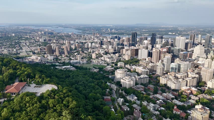 Montreal skyline from Mount Royal with park, lake and greenery in summer, Quebec, Canada. g.