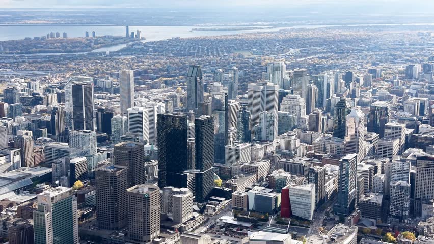 Aerial view of Montreal downtown skyline with autumn colors, urban architecture and city street perspective. g.