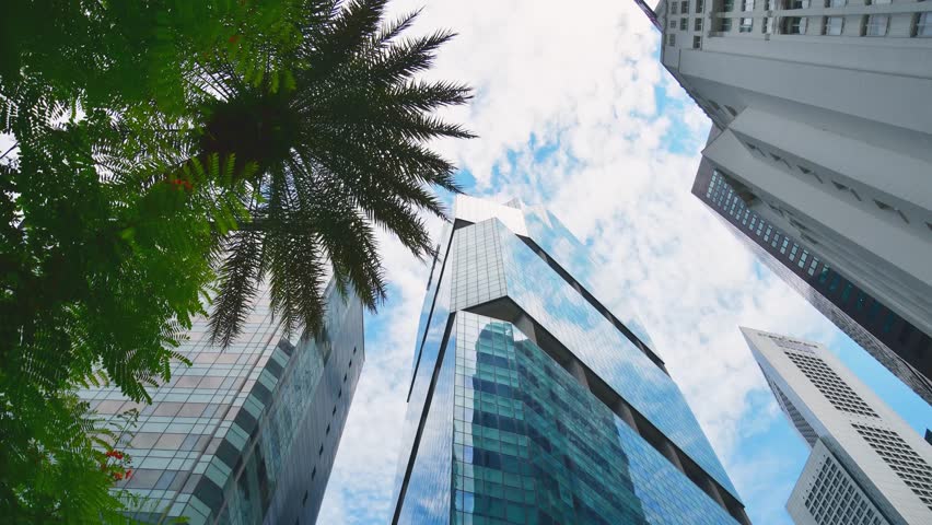 Singapore city, Singapore - 11th april, 2025: timelapse Straits Trading Building Singapore.CBD Raffles Place office tower financial district modern architecture business finance urban development