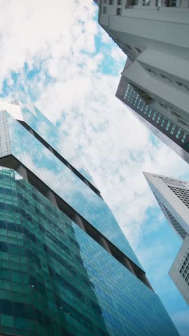 Singapore city, Singapore - 11th april, 2025: timelapse Straits Trading Building Singapore.CBD Raffles Place office tower financial district modern architecture business finance urban development