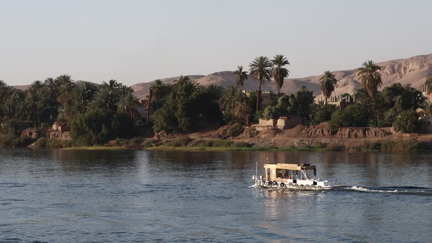 Small passenger ferry sailing on the Nile in Egypt