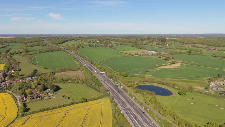 Overhead View of Rural Landscape With Highway, Village and Yellow Fields