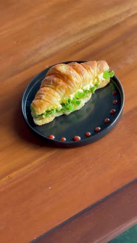 A savory Croissant on a plate