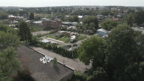 Aerial Drone View of Campsite Cabins in Summer
