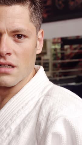 Man practicing karate in fitness studio