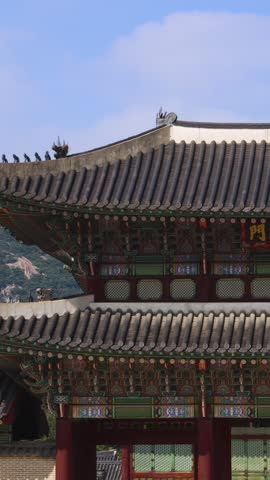 Gyeongbokgung Palace, Seoul, Jongno District, South Korea, in a spring sunny day, exterior view of main Korean royal palace with Bugaksan mountain in the background, museum and palace