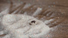 Rhinestones Falling into Glitter in Slow Motion — Cinematic 6x Slow Motion Video Capturing Shimmering Kinetic and Dynamic Particle Impact for High-End Jewelry Crafting Visuals - Powered by Shutterstock - Get 15% off with code: PIKWIZARD15