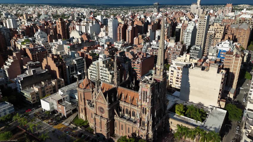 Aerial perspective showcasing the impressive gothic revival architecture of the church of the sacred heart of jesus in córdoba, argentina