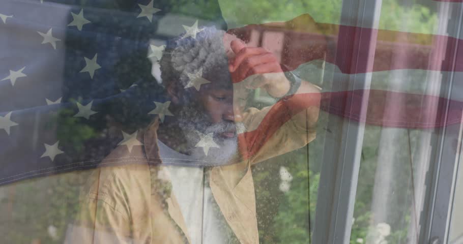 Senior man closing eyes, rubbing temple, moving hand back while reflecting political flag on glass. Window, pane, curtain, home, interior, doubleexposure, stars