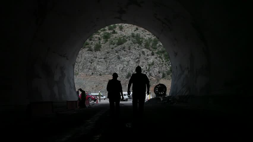 Workers are walking in the Construction of water tunnel