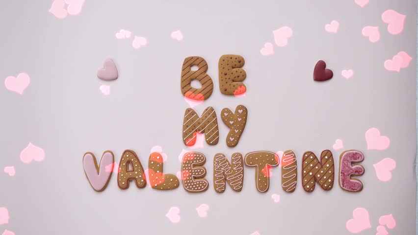 Red Hearts Falling on Valentine Table Scene
