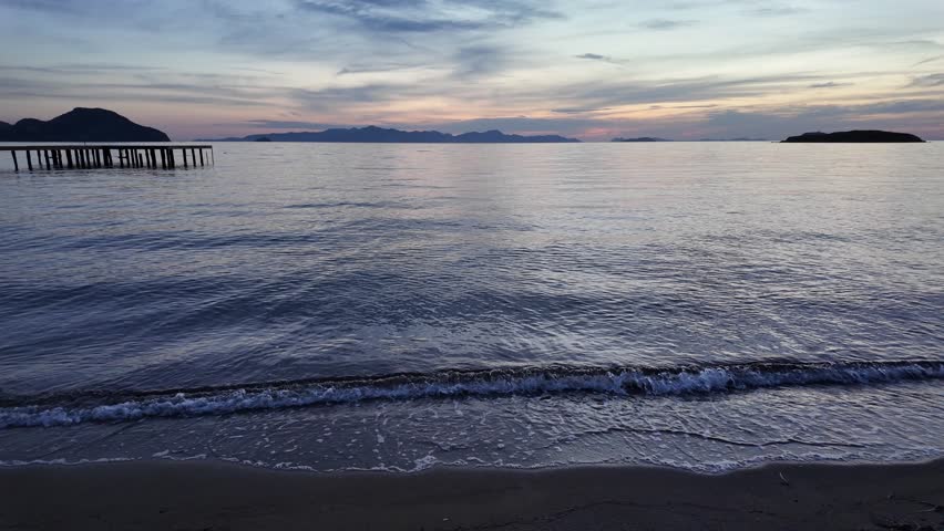 Magnificent sunset on a cloudy day over the Aegean Sea in autumn