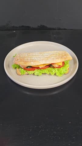 Ham and cheese sandwiches on plate