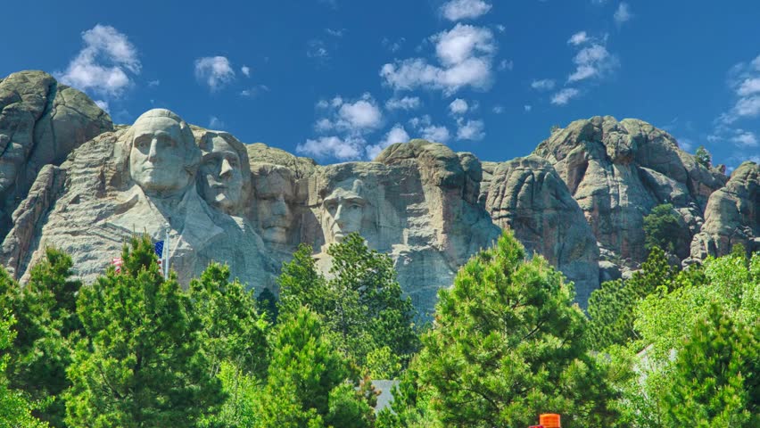 Mount Rushmore National Memorial, South Dakota, USA Mount Rushmore through the tree branches in the forest Forest View to the Mount Rushmore, USA