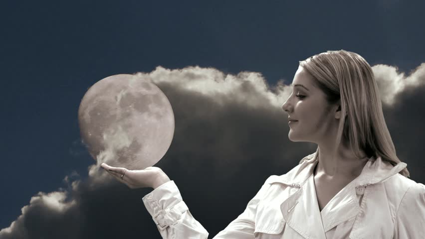 beautiful women looking at full moon