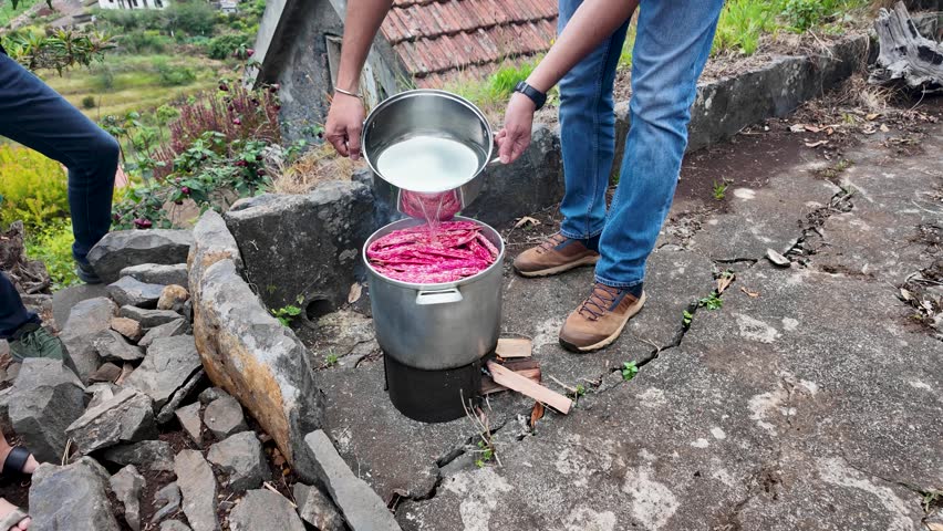 A pot of Cranberry bean cooked on a fire in Camacha mountainous town in municipality of Santa Cruz, Madeira Island, Portugal