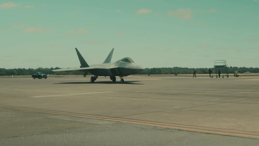 Fighter Jet Taxiing on Runway Before Takeoff.