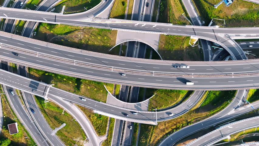 Highways and freeways with numerous cars. System of roads in the rural area of Slovakia. Top view.