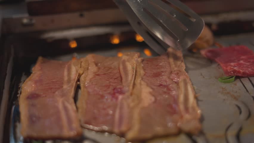 korean barbecue grill meat sizzling restaurant