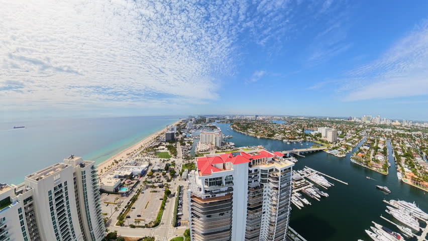 Aerial reveal Fort Lauderdale Beach north view over ocean