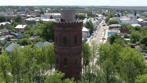 Aerial View of Historic Brick Tower in Small Town