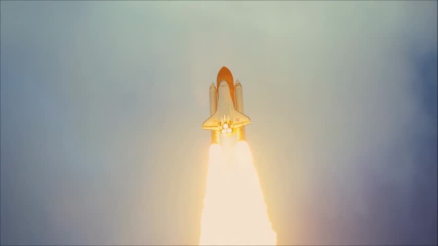 Powerful Space Shuttle Rocket Launch into Space from Launch Pad, with Intense Flame and Smoke Trail