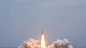 Powerful Space Shuttle Rocket Launch into Space from Launch Pad, with Intense Flame and Smoke Trail - Powered by Shutterstock - Get 15% off with code: PIKWIZARD15