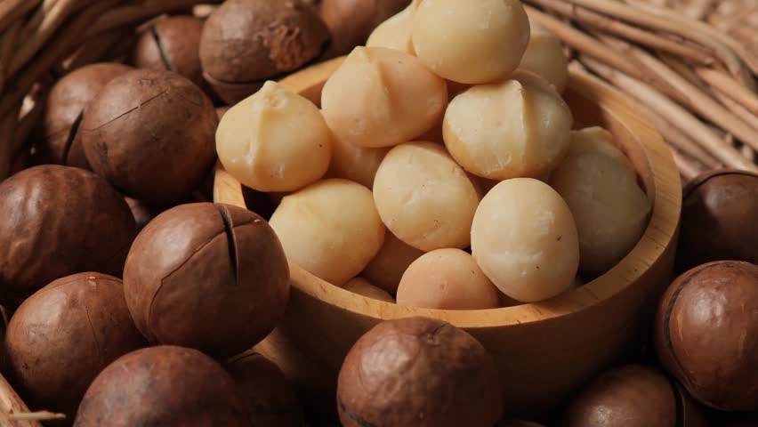 Macadamia nuts in a wood bowl