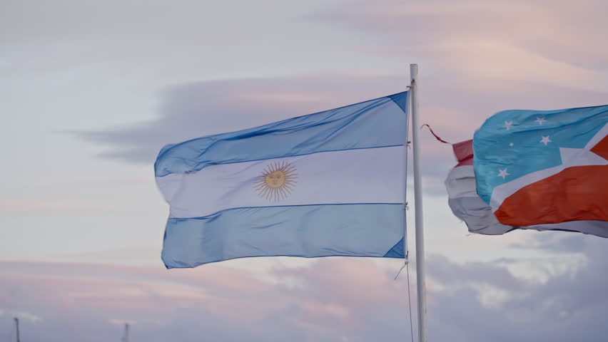 Argentina Flag and Tierra del Fuego Flag Waving Ushuaia