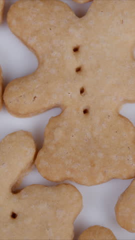 Homemade bear cookies display. Golden cookies with dotted details shown. Warm neutral photography capturing homemade bear cookies ideal for packaging designs and branding