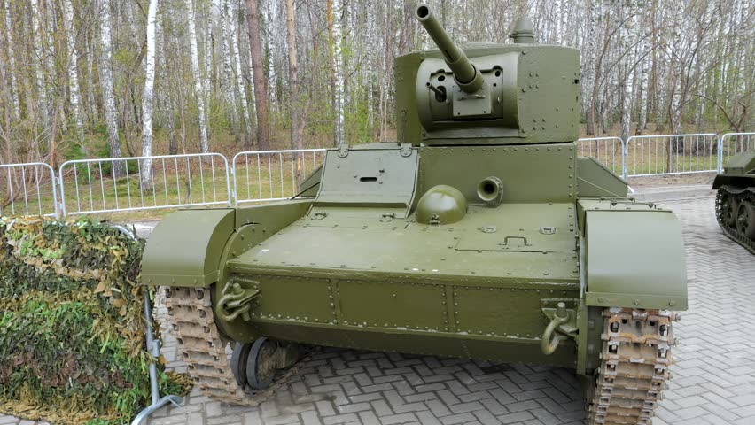 Small tracked military vehicle on museum display