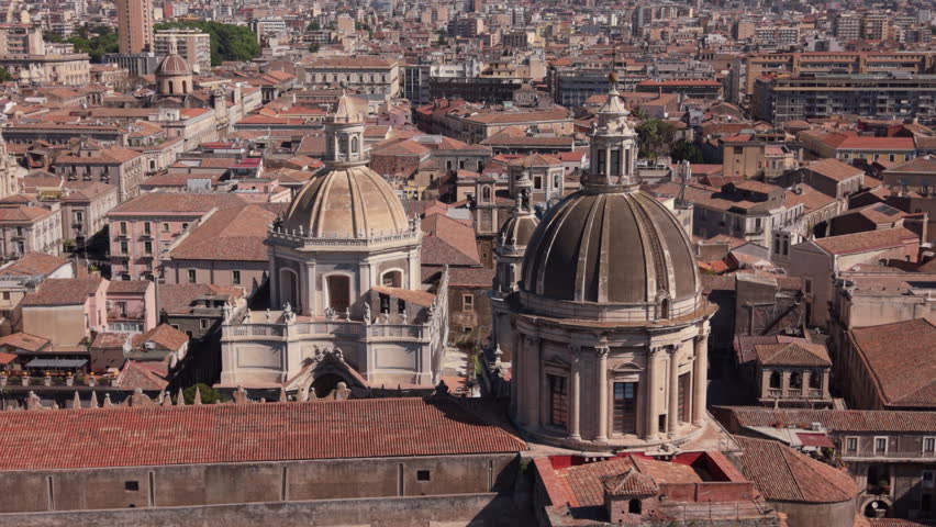 overhead view of Catania descending and tilting up revealing Mt. Etna