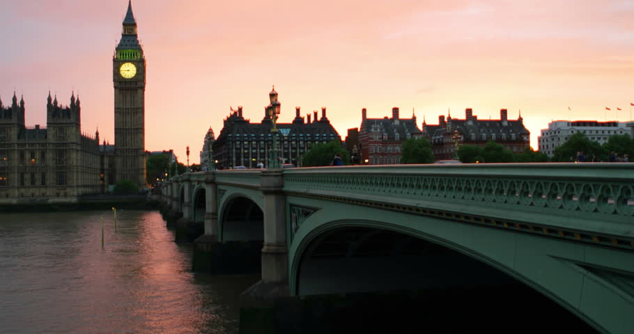 London, UK. Sunset over the city of London, UK. Colorful sky behind Westminster and Big Ben. Westminster bridge at night