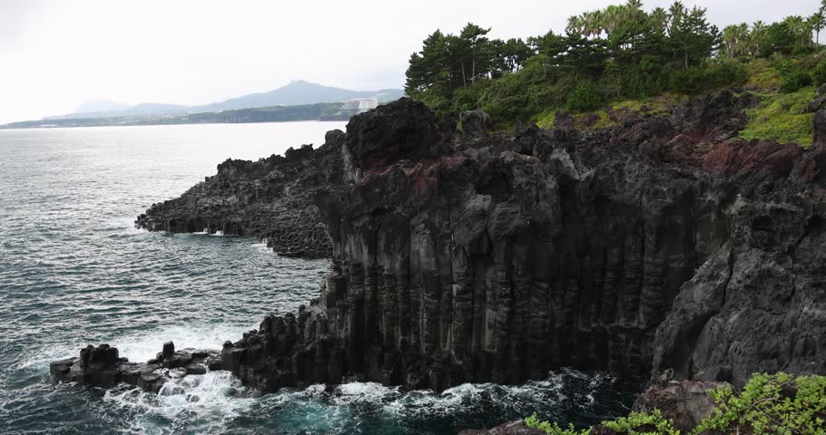 Daepo Jusangjeolli Cliff landscape, Jeju island, volcanic rock formation, Jeju-do, South Korea, Ieodo-ro, Seogwipo, Jeju Province, Columnar jointing view with waves and sea, Korean Natural Monument