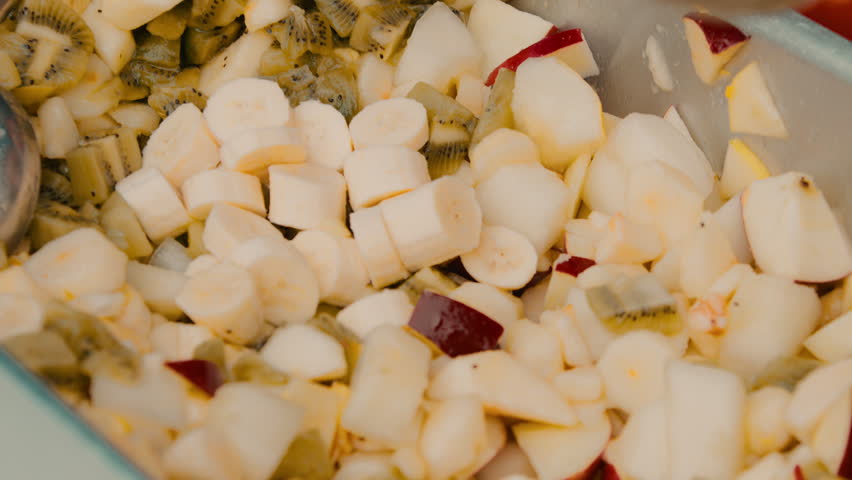 Fruit salad with bananas, peaches and kiwi served during Vaisakhi celebration