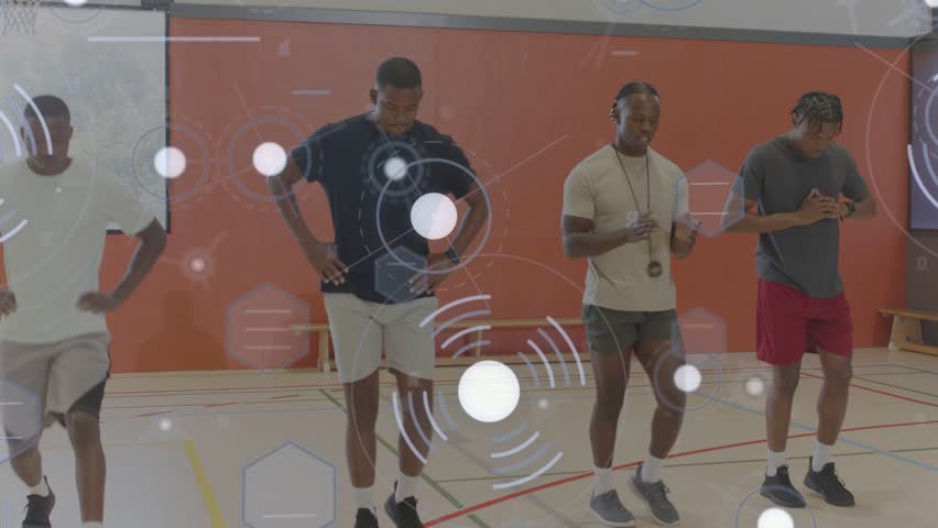 Coach blowing whistle, men warming up for training while translucent overlay tracking leg motion. Gym, court, trainer, drills, teamwork, daylight, bench