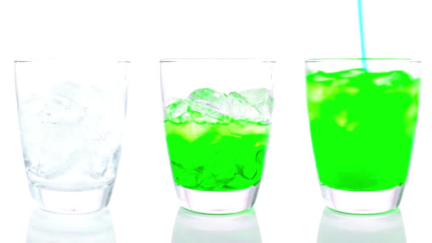 Green soft drink soda pouring into three glasses with ice cubes, refreshing bubbles, condensation droplets, vibrant color, studio lighting, clean background, cinematic beverage shot, high resolution 4K video.