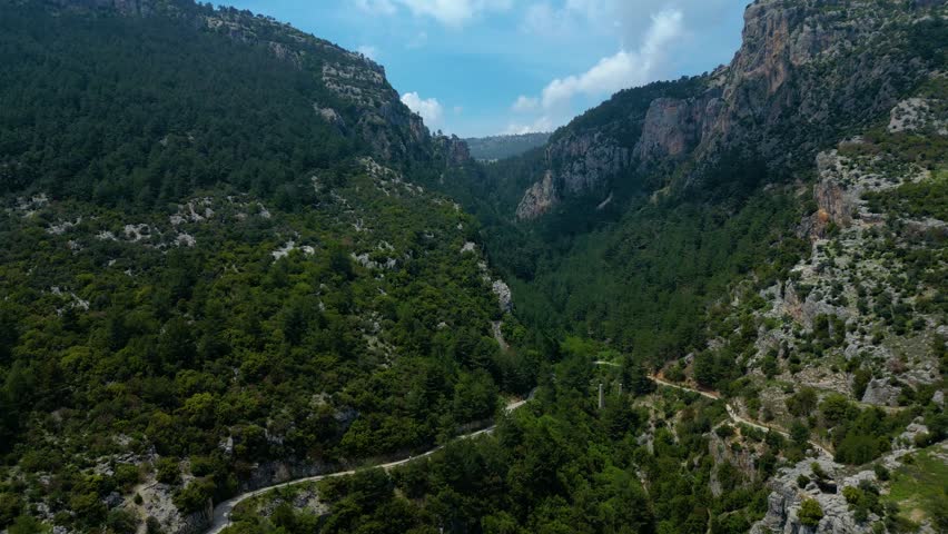 Scenic Landscape with Mountains and Valley Road