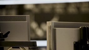 Stock market trading floor with desktop monitors in foreground and rising DAX chart - Powered by Shutterstock - Get 15% off with code: PIKWIZARD15