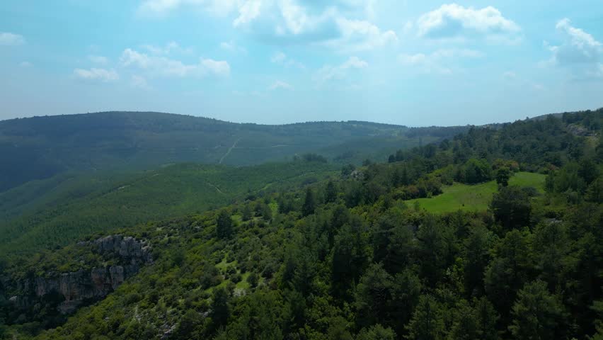 Scenic Landscape with Mountains and Valley Road