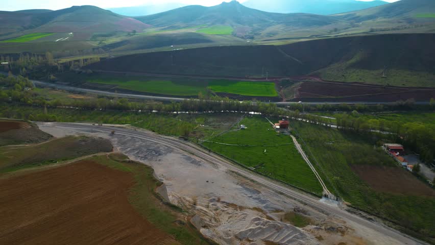 Scenic Landscape with Mountains and Valley Road