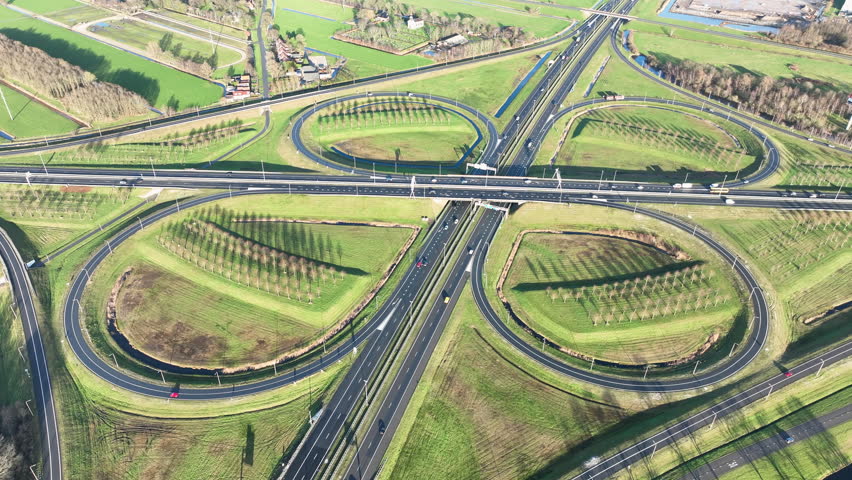Aerial view of a large highway cloverleaf junction near Heerenveen in Friesland, Netherlands, Europe.